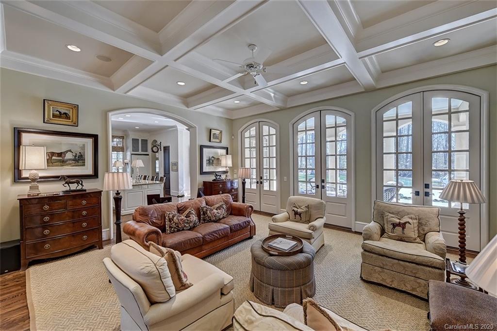6256 Sharon Hills Road Charlotte, NC 28210 - Photo 9 of 45 a living room with furniture ceiling fan and a rug