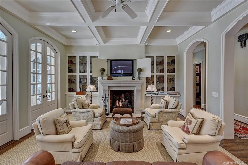 6256 Sharon Hills Road Charlotte, NC 28210 - Photo 10 of 45 a living room with furniture and a fireplace