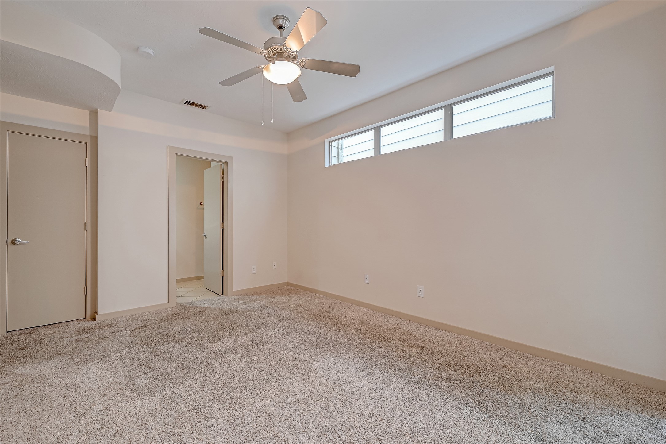 5315 Lillian Street Houston, TX 77007 - Photo 21 of 47 a view of an empty room with a window