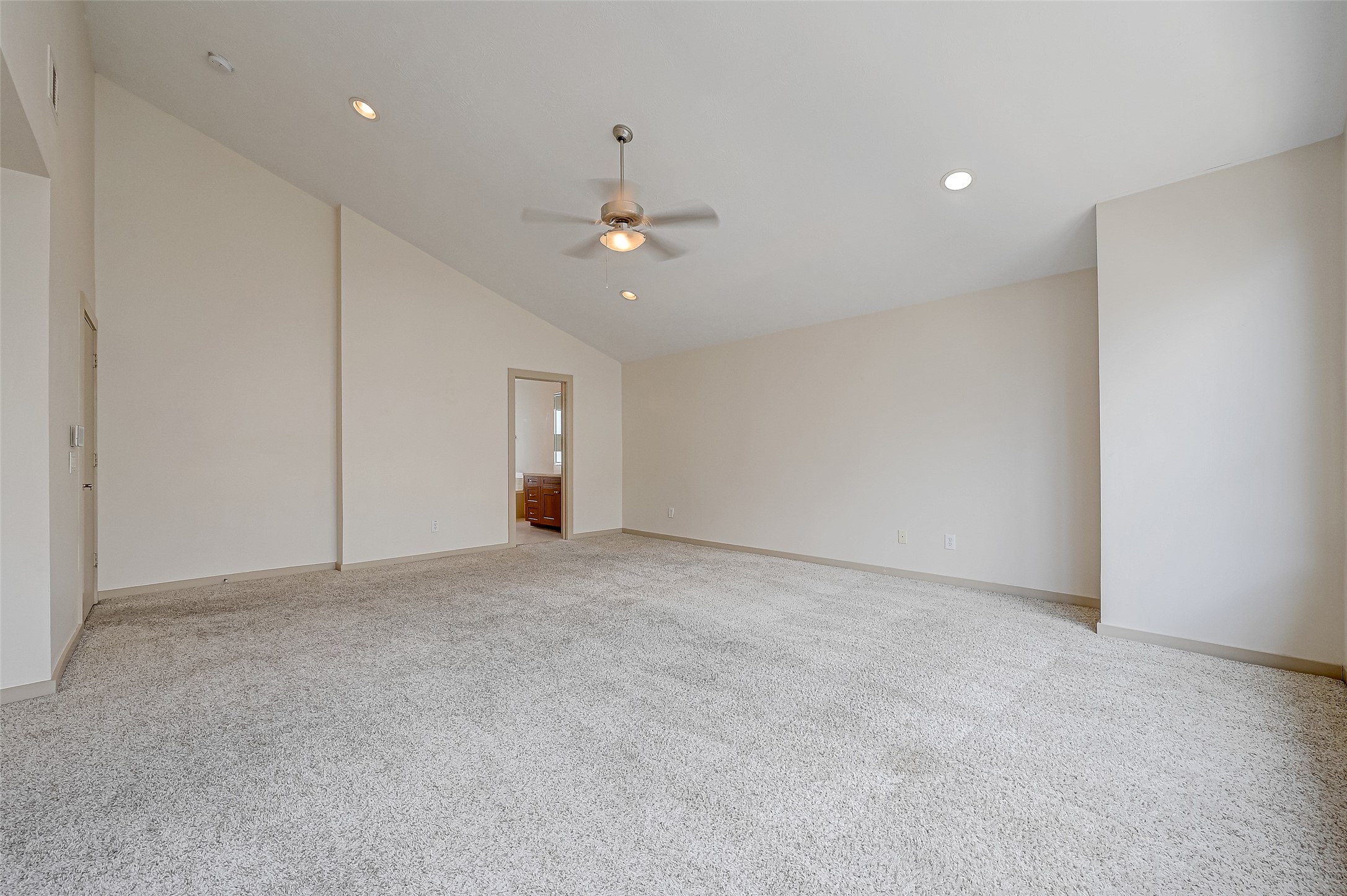 5315 Lillian Street Houston, TX 77007 - Photo 33 of 47 a view of an empty room with a ceiling fan