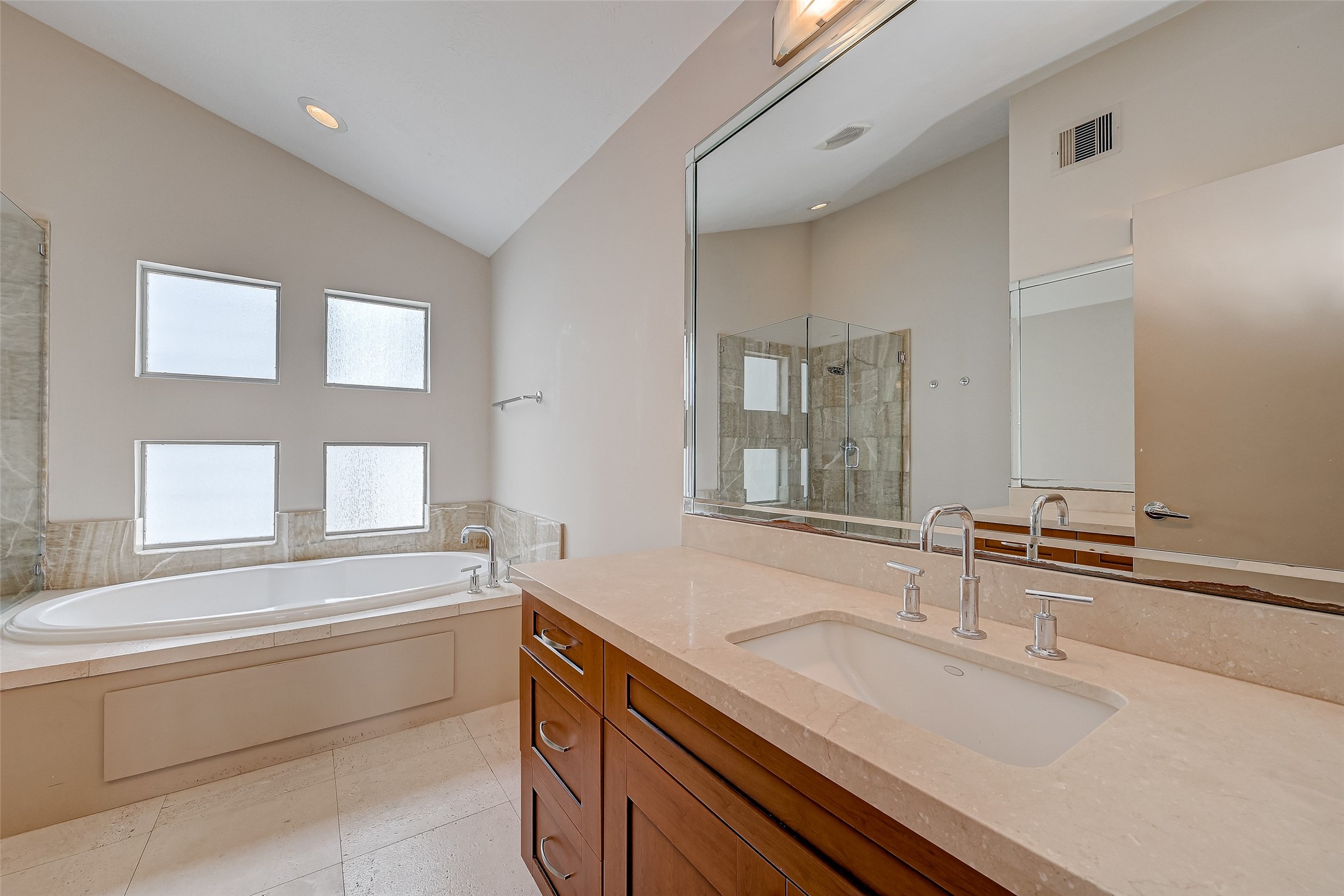 5315 Lillian Street Houston, TX 77007 - Photo 37 of 47 a bathroom with a sink and a bathtub