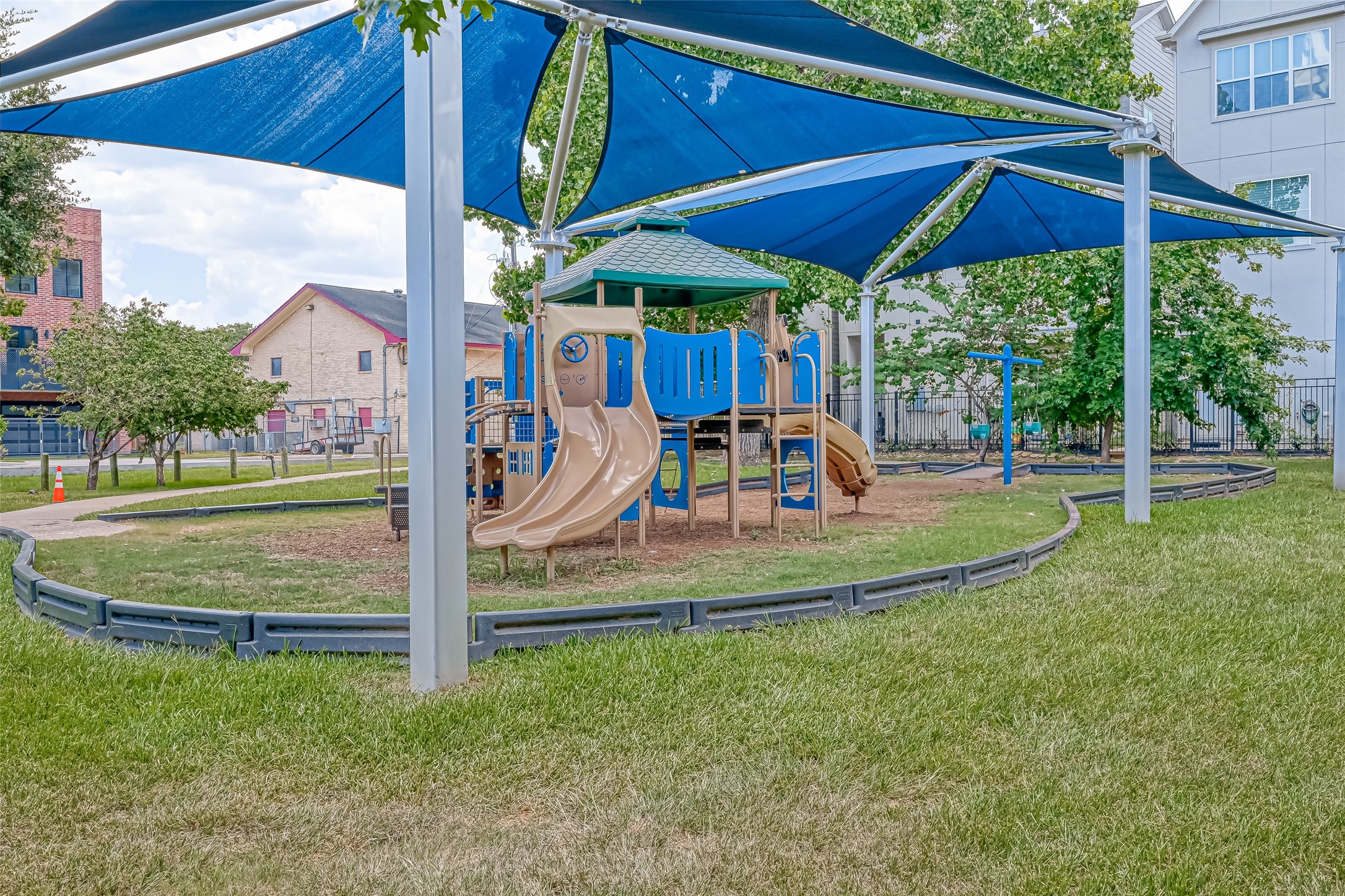 5315 Lillian Street Houston, TX 77007 - Photo 47 of 47 a view of a table and chairs under an umbrella