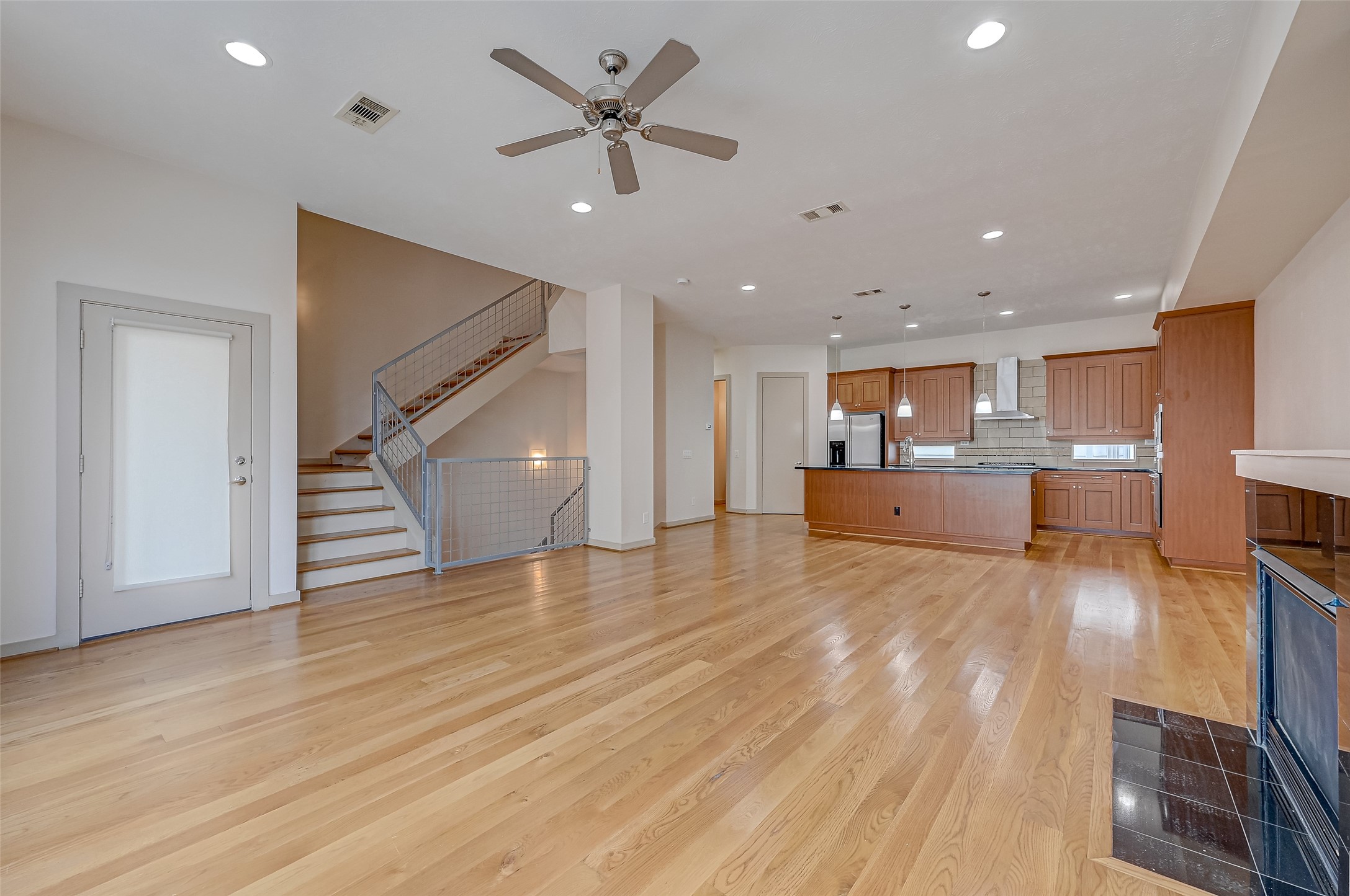 5315 Lillian Street Houston, TX 77007 - Photo 8 of 47 a view of kitchen and hall with wooden floor