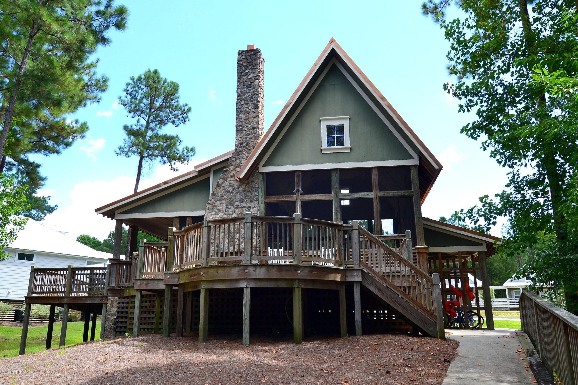830 Mill Creek Road Minnesott Beach, NC 28510 - Photo 18 of 34 13 kayak center Outfitters back
