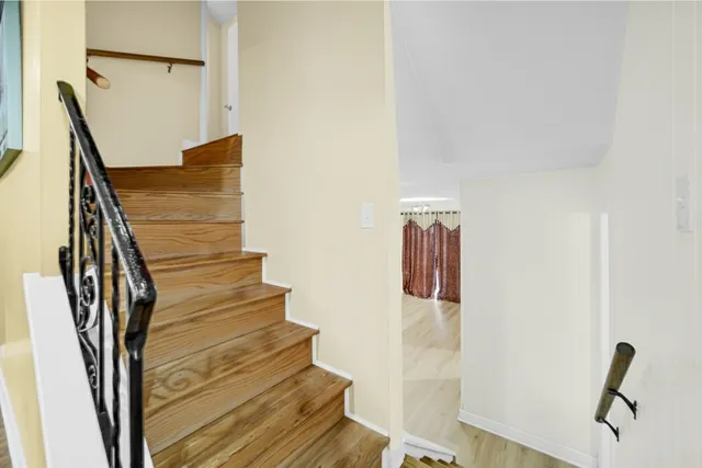 a view of entryway with wooden floor