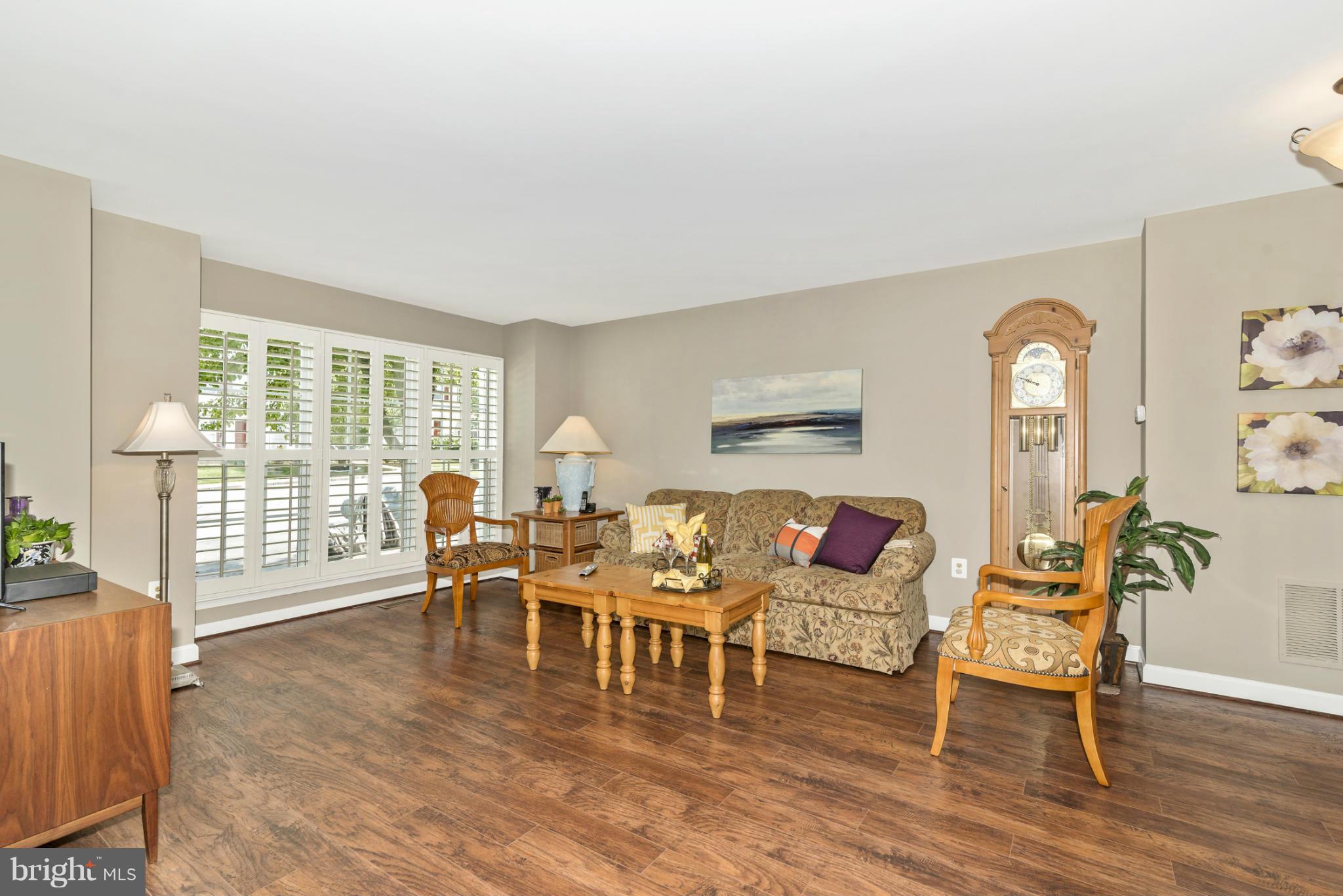 9228 Ridgefield Circle Frederick, MD 21701 - Photo 5 of 27 Living Room with Plantation Shutters