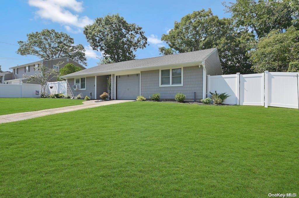 8 Majestic Road Selden, NY 11784 - Photo 1 of 1 a front view of house with yard and green space