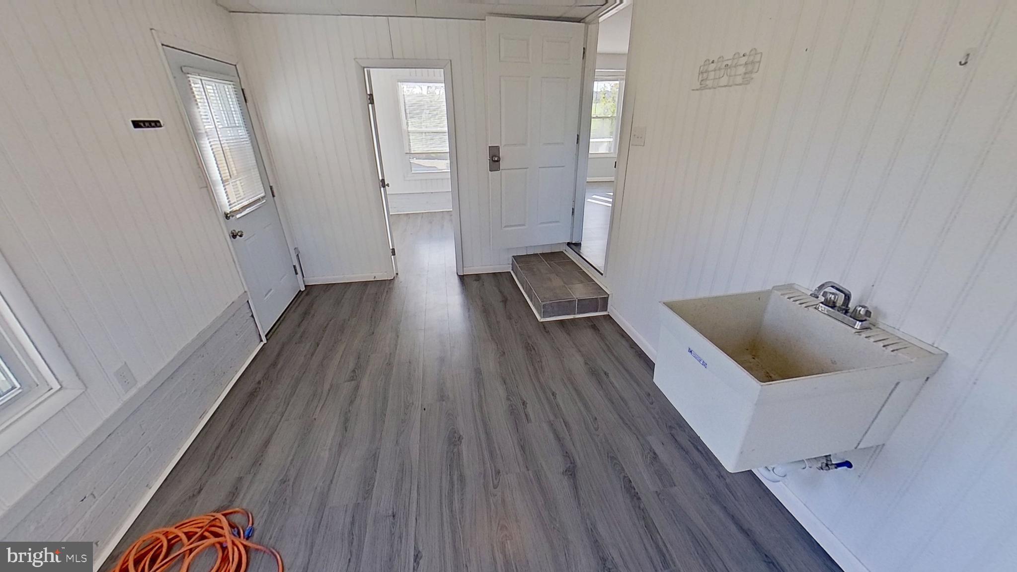 490 Windsor Street, Unit B Red Lion, PA 17356 - Photo 7 of 15 wooden floor in an empty room