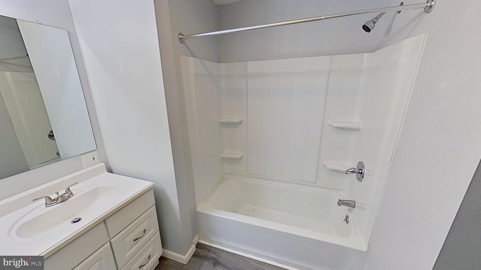 490 Windsor Street, Unit B Red Lion, PA 17356 - Photo 9 of 15 a bathroom with a bathtub and a sink