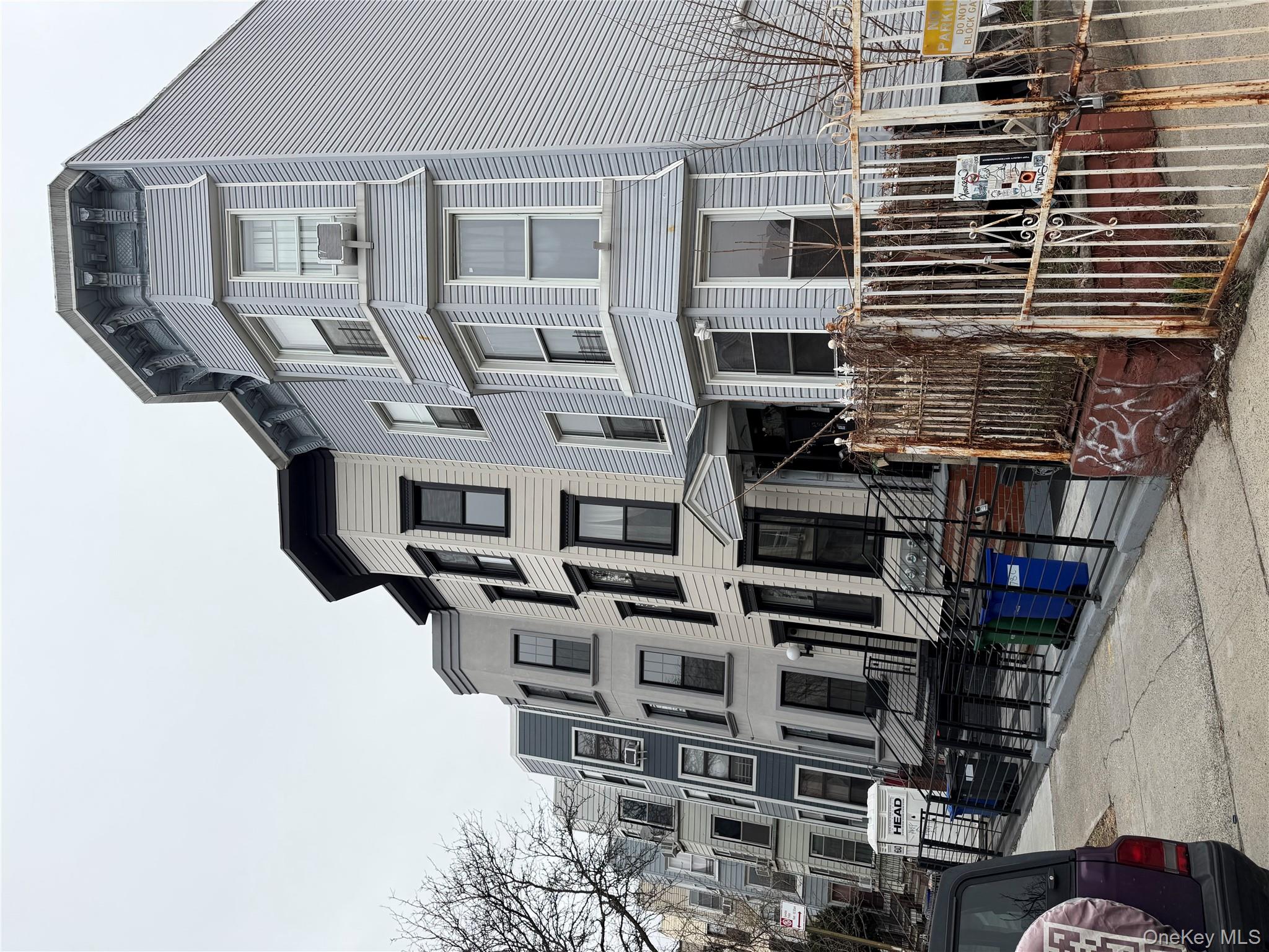 a front view of a building with glass windows