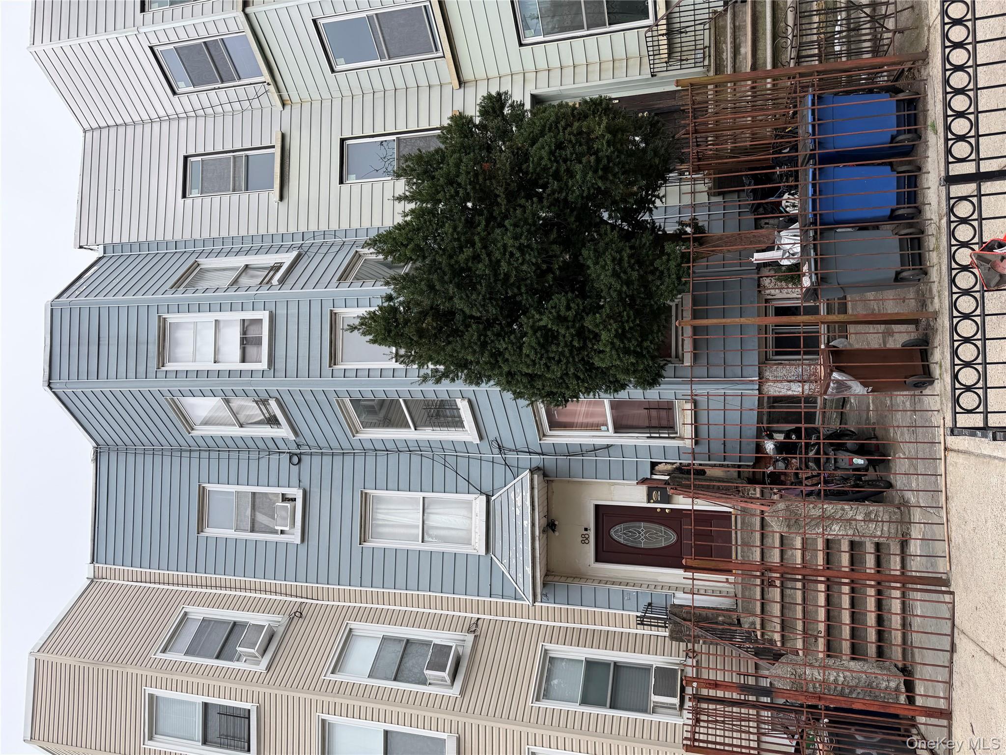 88 Cornelia Street Brooklyn, NY 11221 - Photo 2 of 8 a front view of a building with balcony