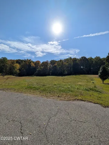 a view of an ocean and mountain