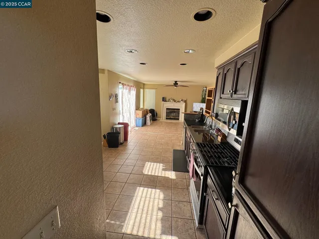 a view of a hallway with seating area