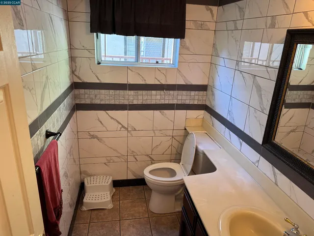 a bathroom with a sink and a toilet