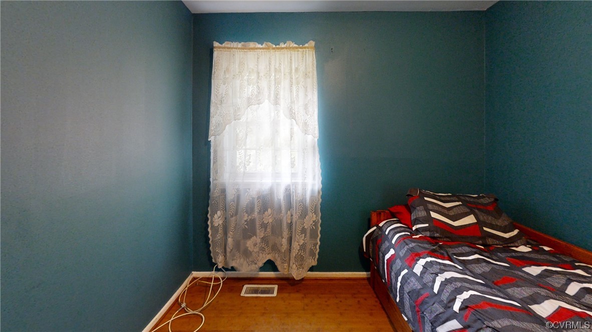 3300 Sylvania Road Chester, VA 23831 - Photo 11 of 16 a bedroom with a bed and a window