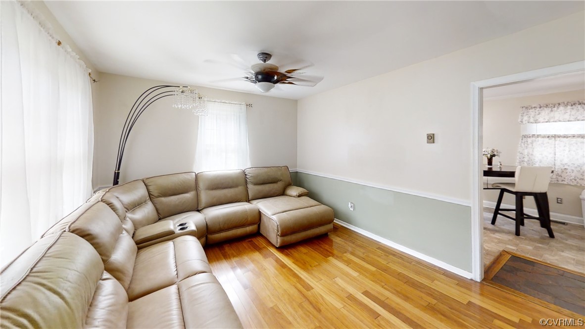 3300 Sylvania Road Chester, VA 23831 - Photo 3 of 16 a living room with furniture and a wooden floor