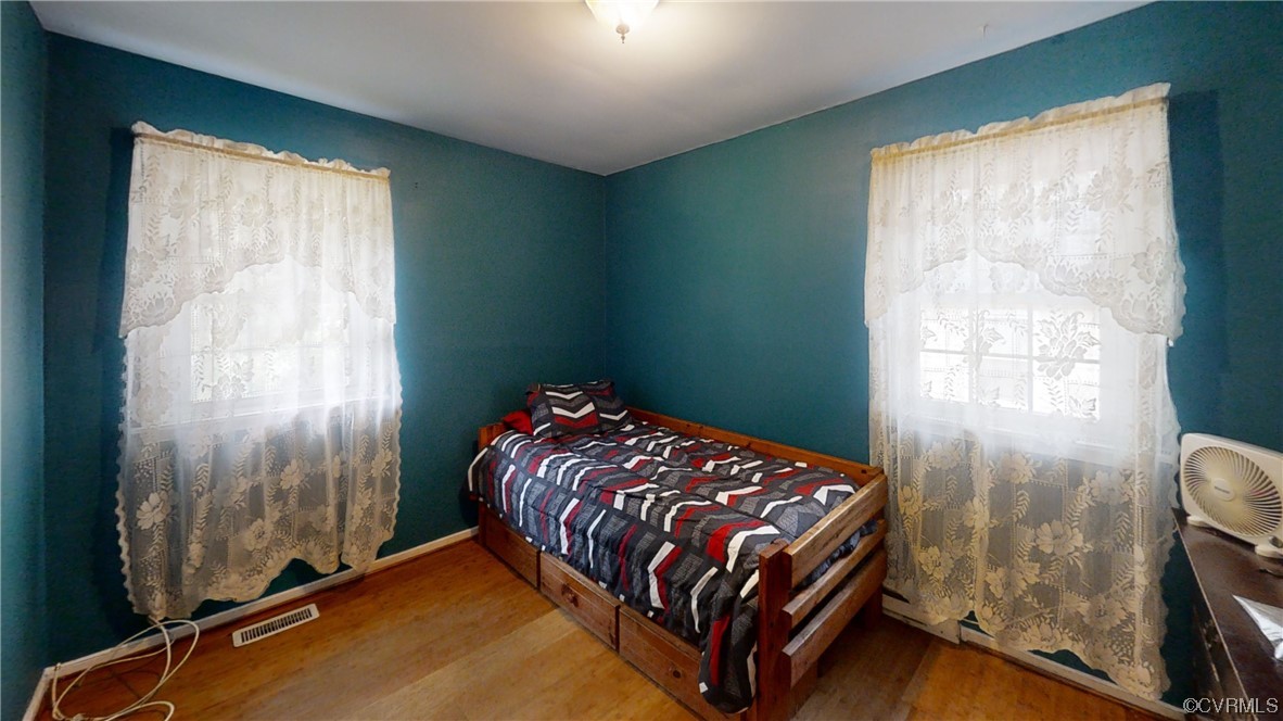 3300 Sylvania Road Chester, VA 23831 - Photo 10 of 16 a bedroom with a bed and a window
