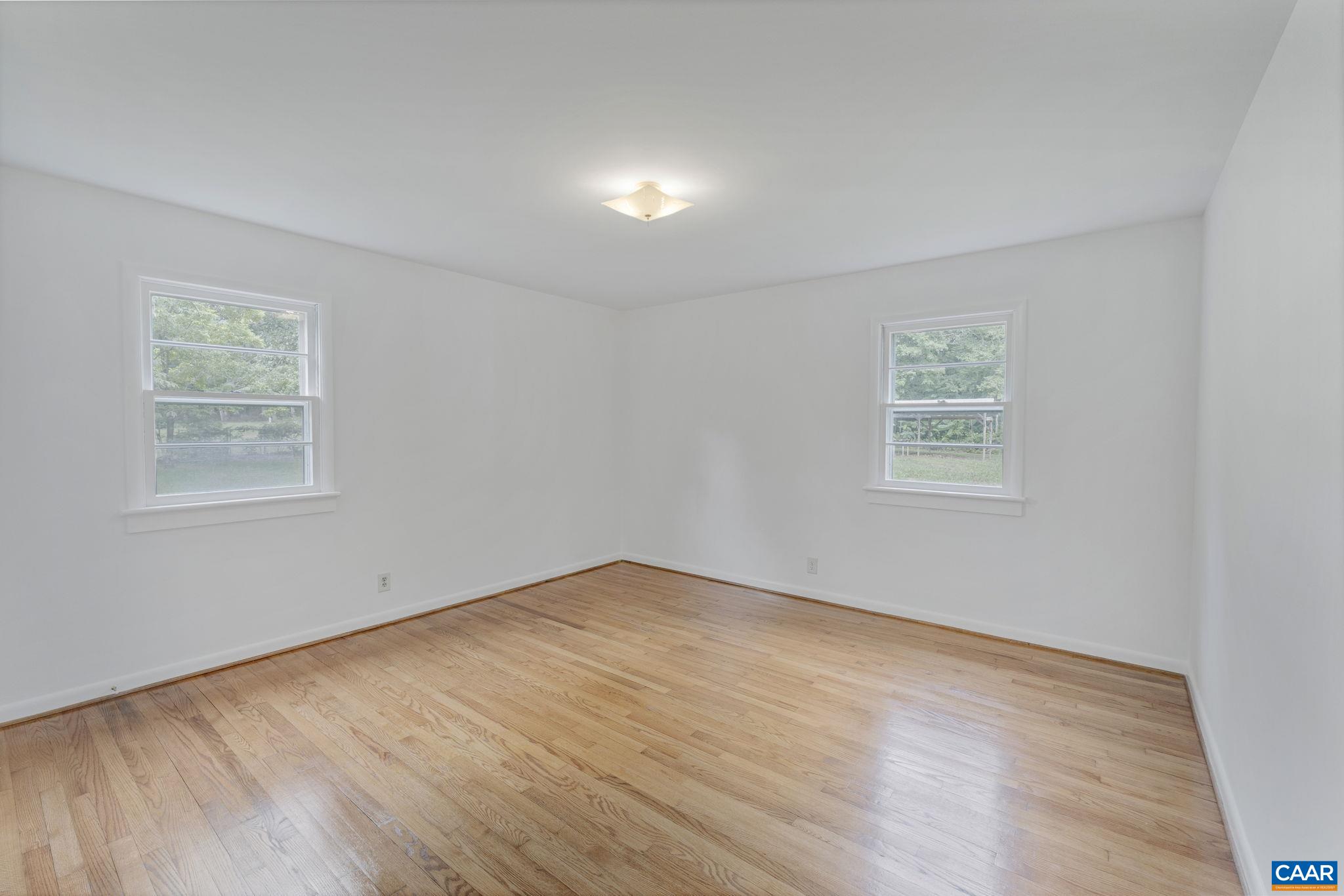 12395 South Constitution Route Scottsville, VA 24590 - Photo 14 of 37 an empty room with a window