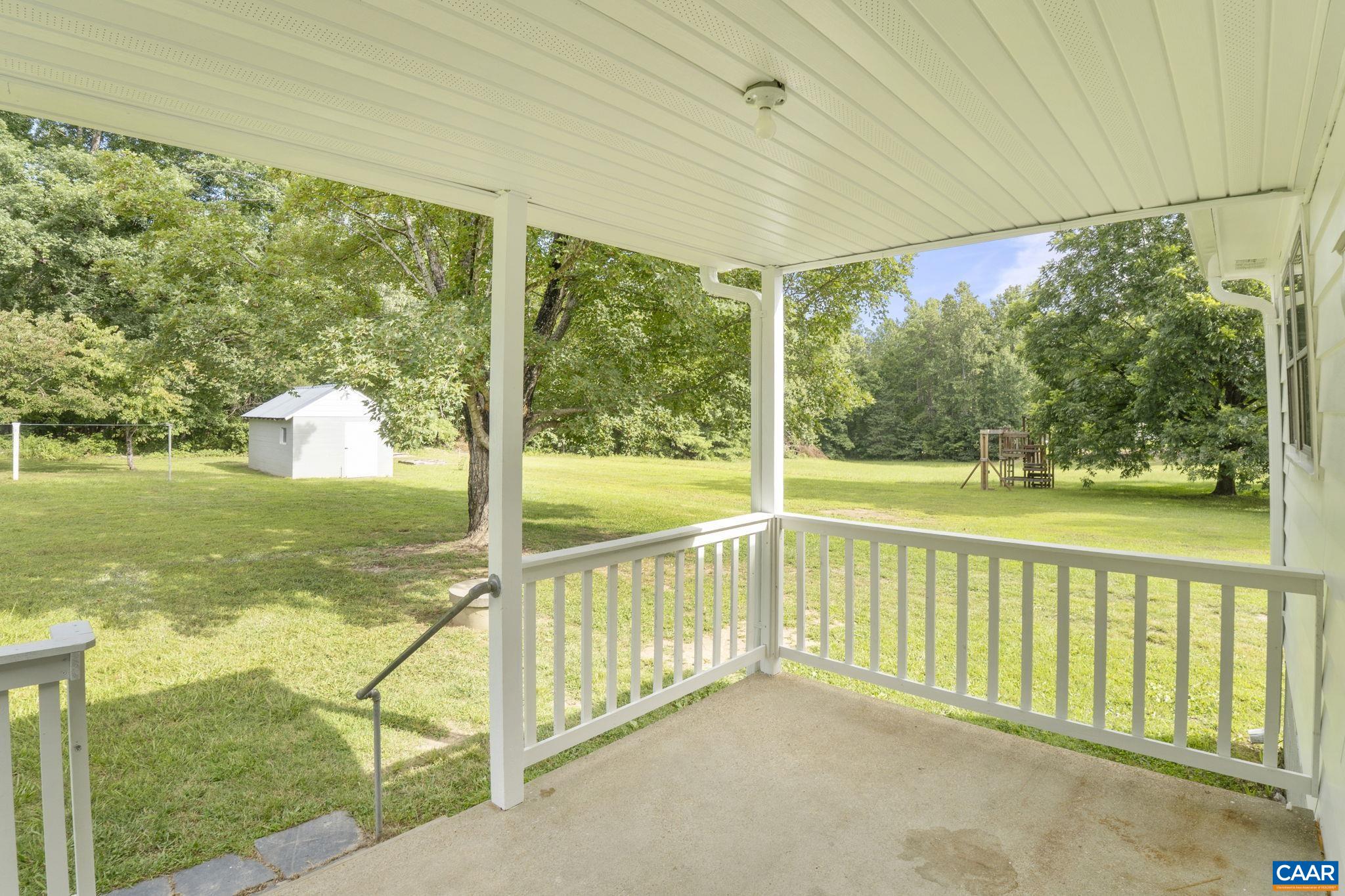12395 South Constitution Route Scottsville, VA 24590 - Photo 19 of 37 a view of an outdoor space and swimming pool