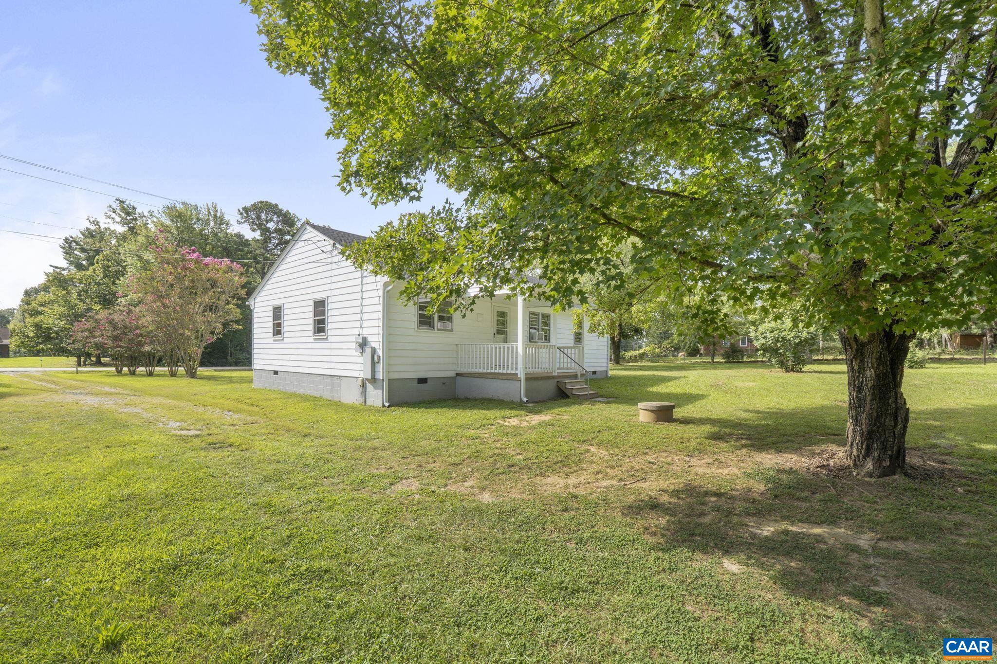 12395 South Constitution Route Scottsville, VA 24590 - Photo 28 of 37 a view of a house with a yard