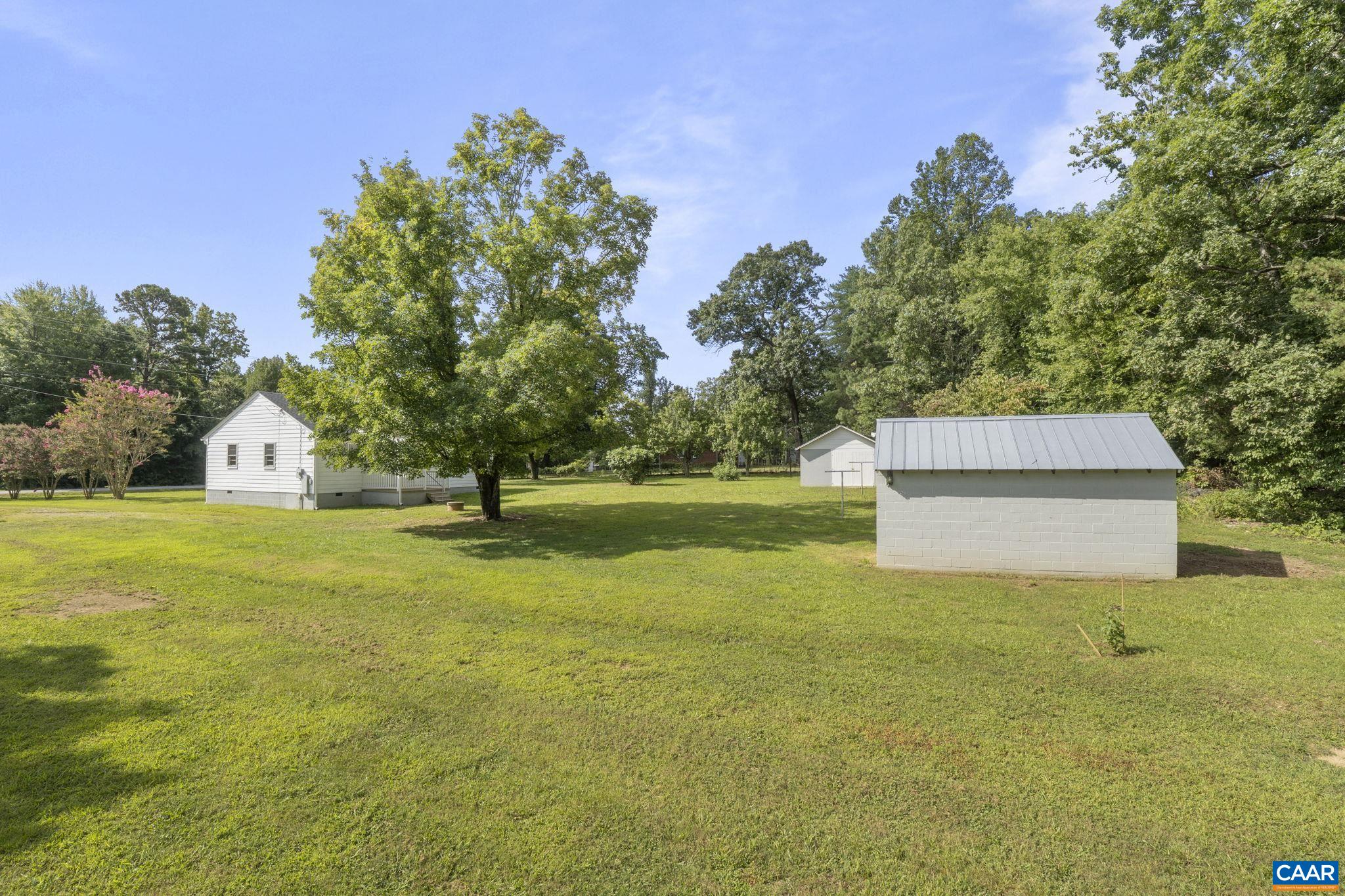 12395 South Constitution Route Scottsville, VA 24590 - Photo 32 of 37 a view of a house with a yard