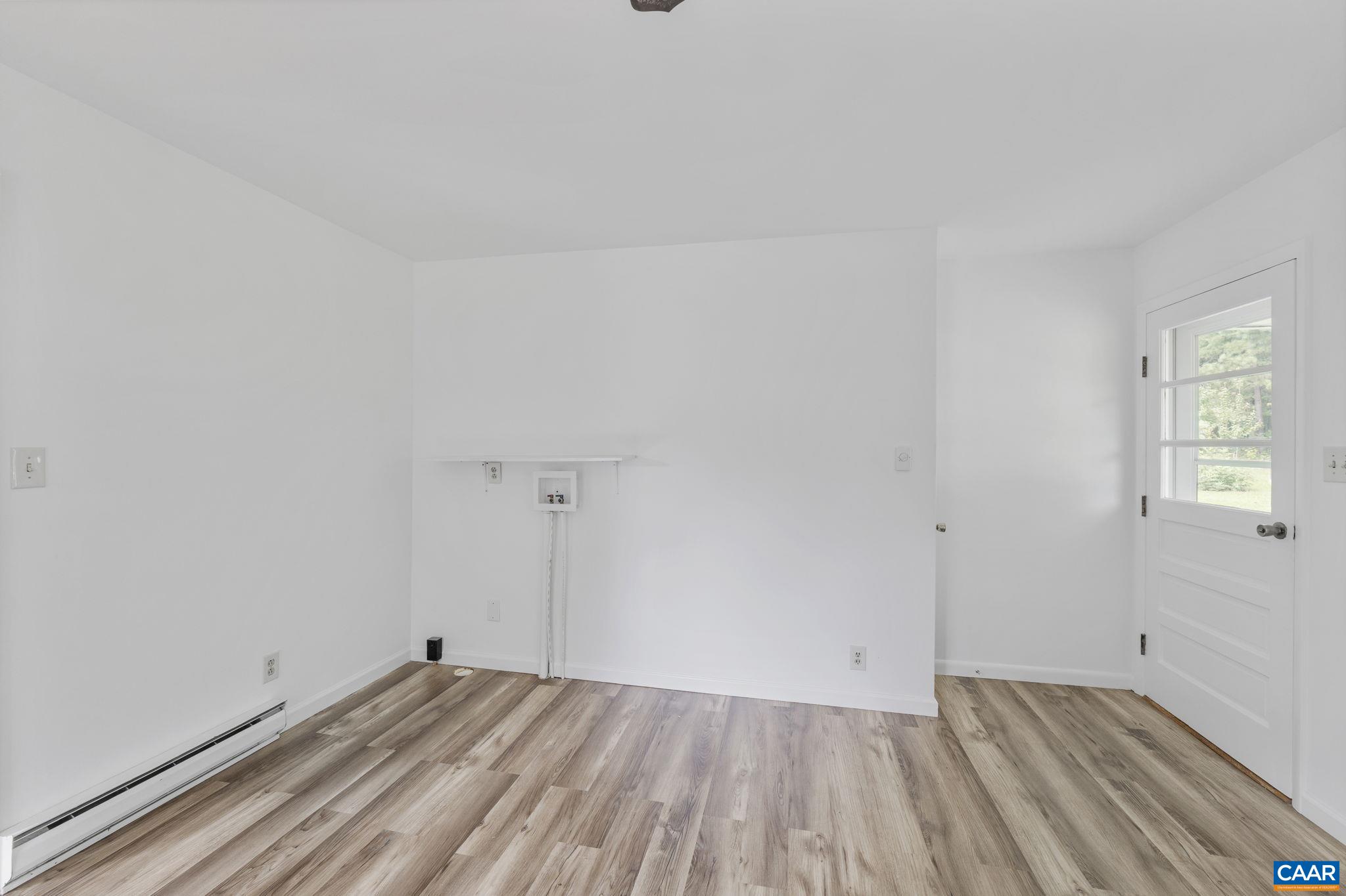 12395 South Constitution Route Scottsville, VA 24590 - Photo 9 of 37 a view of wooden floor in a room