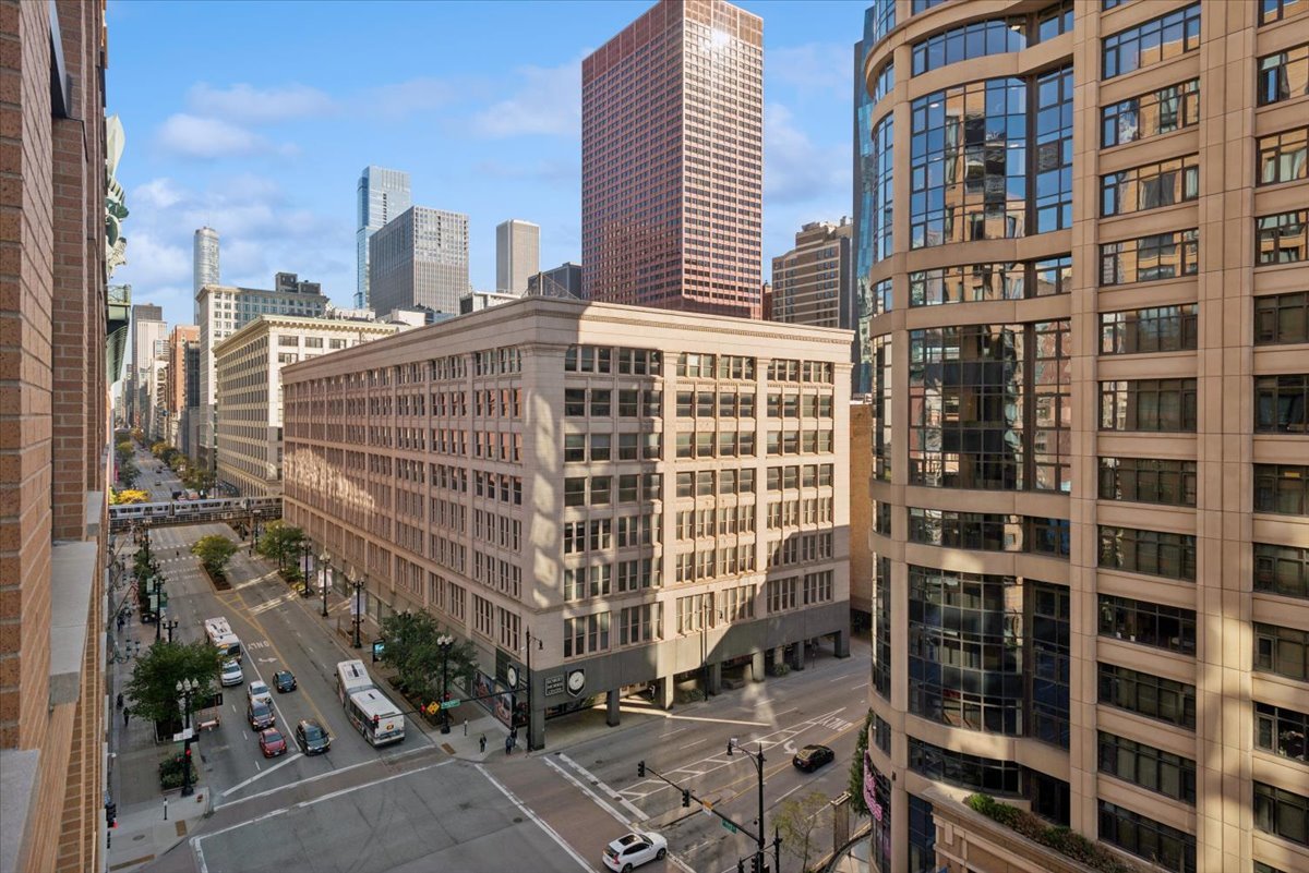 520 South State Street, Unit 907 Chicago, IL 60605 - Photo 7 of 26 a front view of a building with glass windows