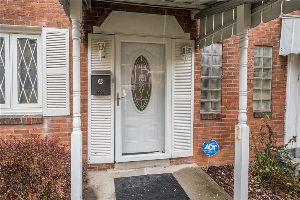 227 East Garden Road Pittsburgh, PA 15227 - Photo 15 of 27 Covered front porch provides a welcome entry into the home.