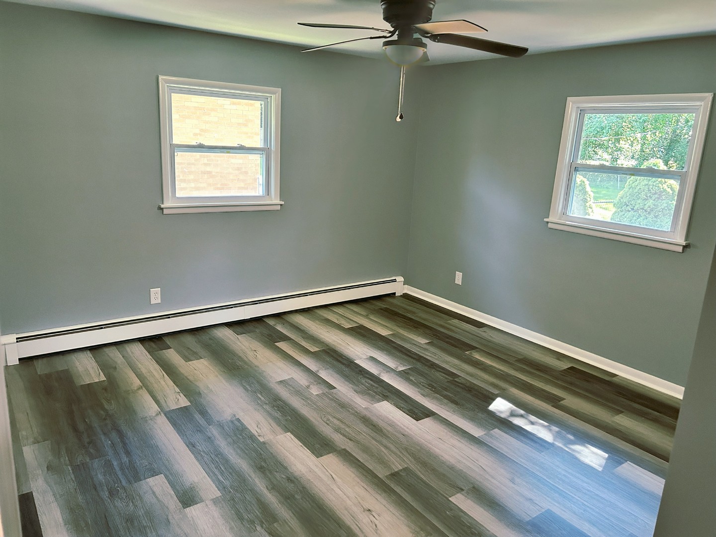 55 Cherry Drive Kankakee, IL 60901 - Photo 16 of 42 a view of a room with a window and ceiling fan