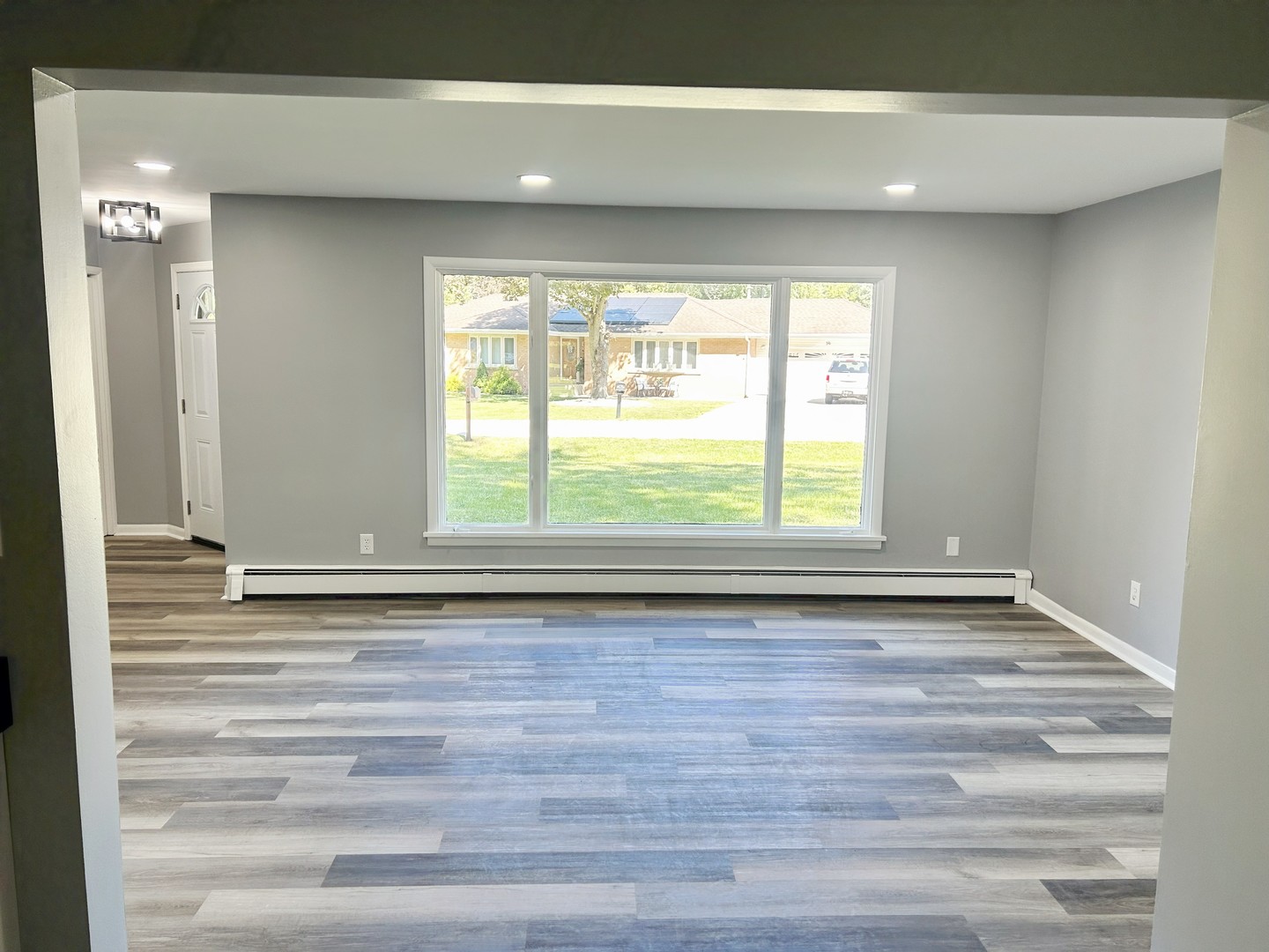 55 Cherry Drive Kankakee, IL 60901 - Photo 5 of 42 a view of a room with wooden floor and window