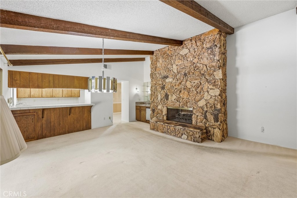 37295 Oak View Road Yucaipa, CA 92399 - Photo 25 of 59 a view of an empty room with a fireplace