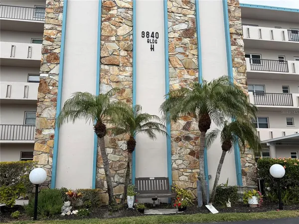 a front view of a multi story residential apartment building