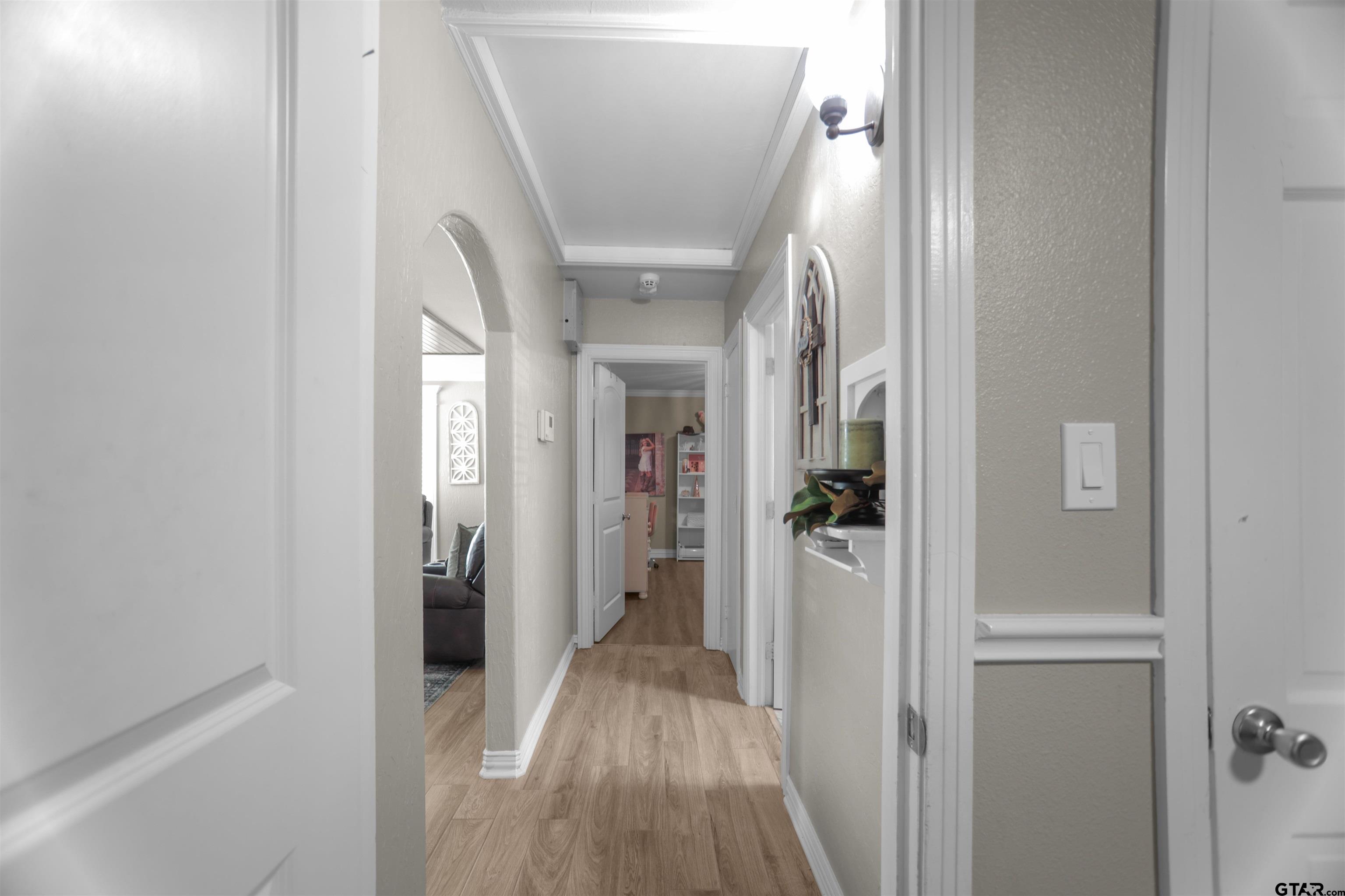 11931 State Highway 64 Tyler, TX 75704 - Photo 18 of 44 a view of a hallway with wooden floor and closet
