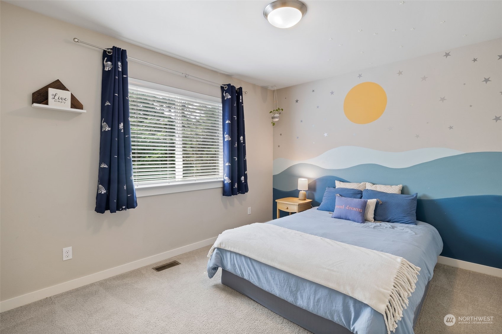 18 213th Street Southwest Bothell, WA 98021 - Photo 33 of 40 a bedroom with a bed and window