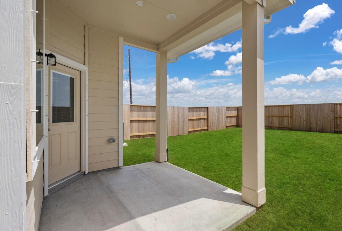 5234 Capricorn Way Manvel, TX 77578 - Photo 21 of 25 a view of a backyard with garden