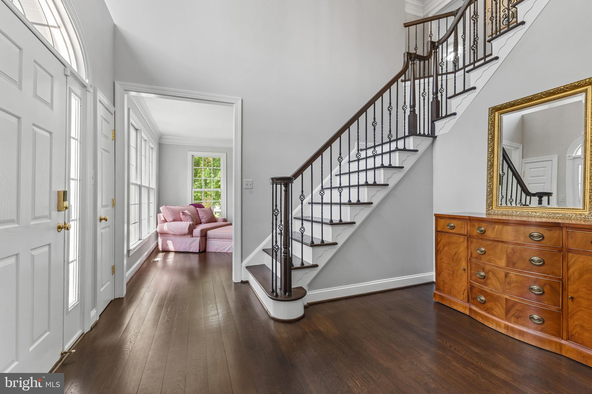 15006 Ransom Oaks Court Gainesville, VA 20155 - Photo 4 of 57 Elegant foyer with classic staircase.