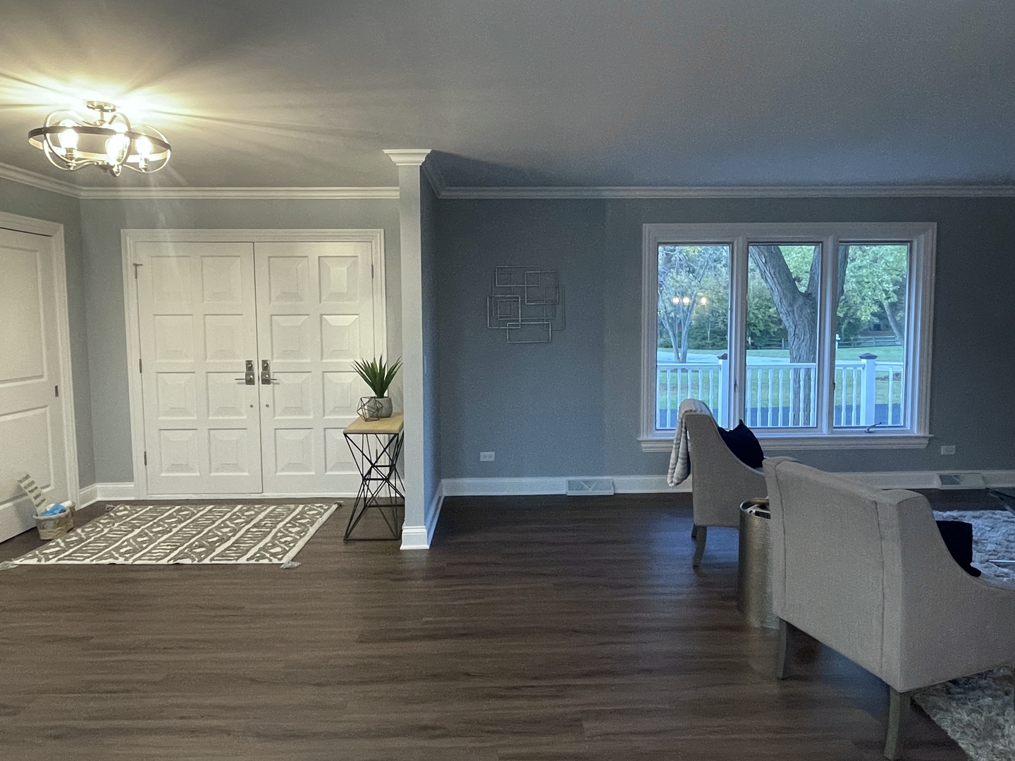 5N430 Oak Road St. Charles, IL 60175 - Photo 2 of 36 a view of an empty room with window and wooden floor