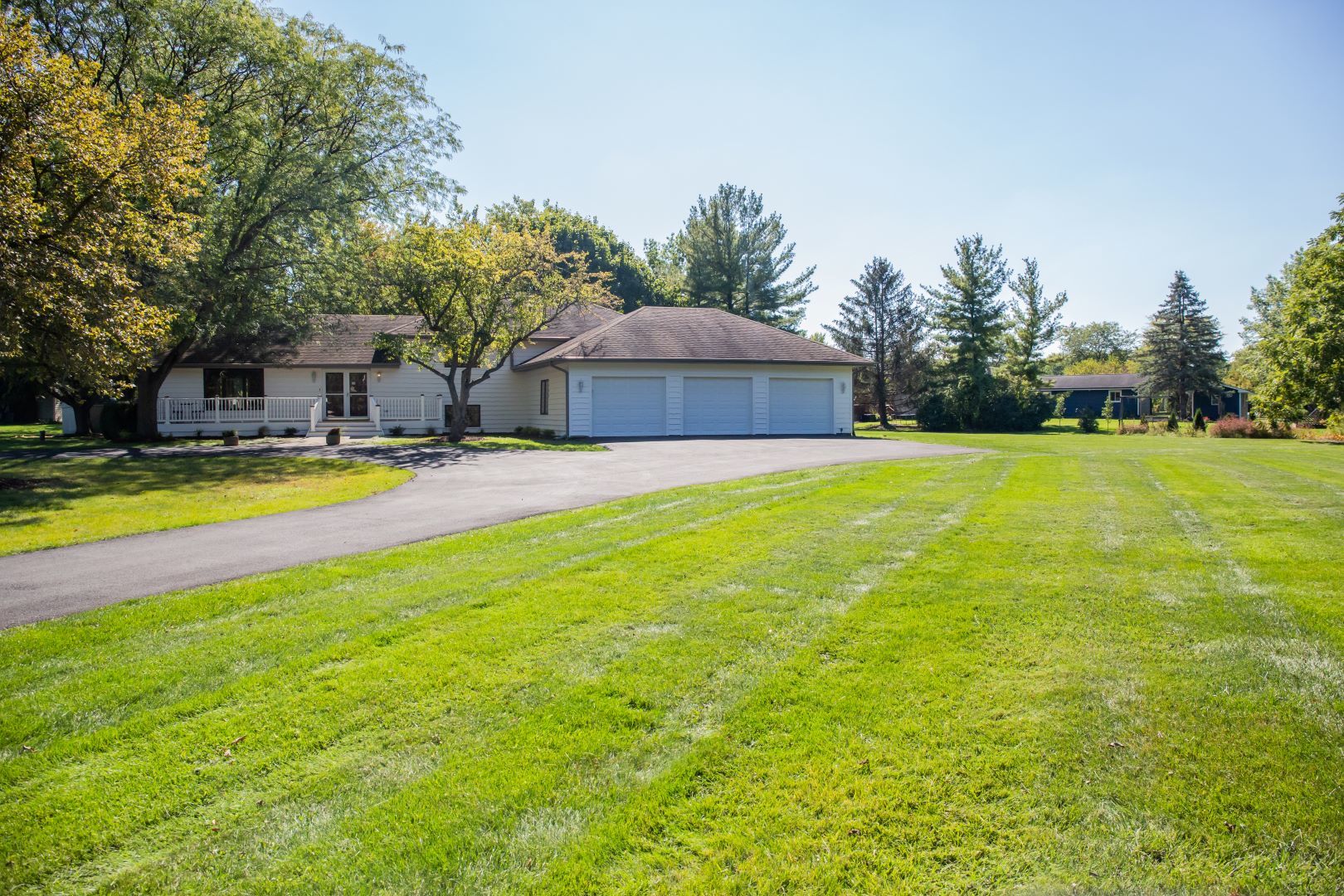 5N430 Oak Road St. Charles, IL 60175 - Photo 32 of 36 a swimming pool with outdoor seating and yard