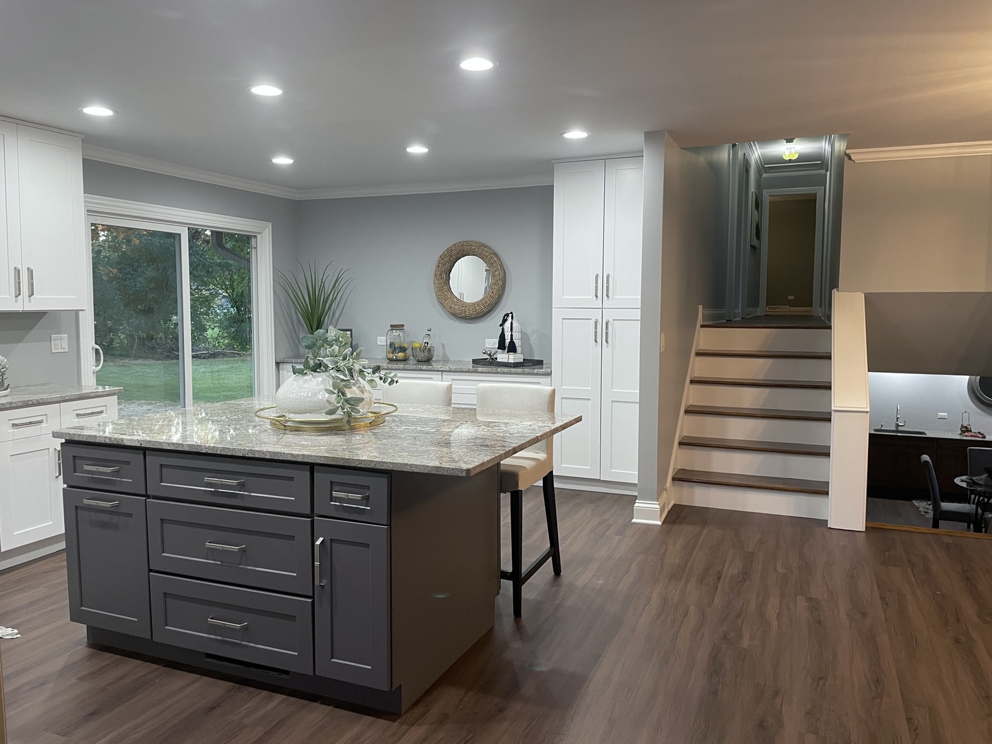 5N430 Oak Road St. Charles, IL 60175 - Photo 10 of 36 a kitchen with a wooden floor and a view of living room