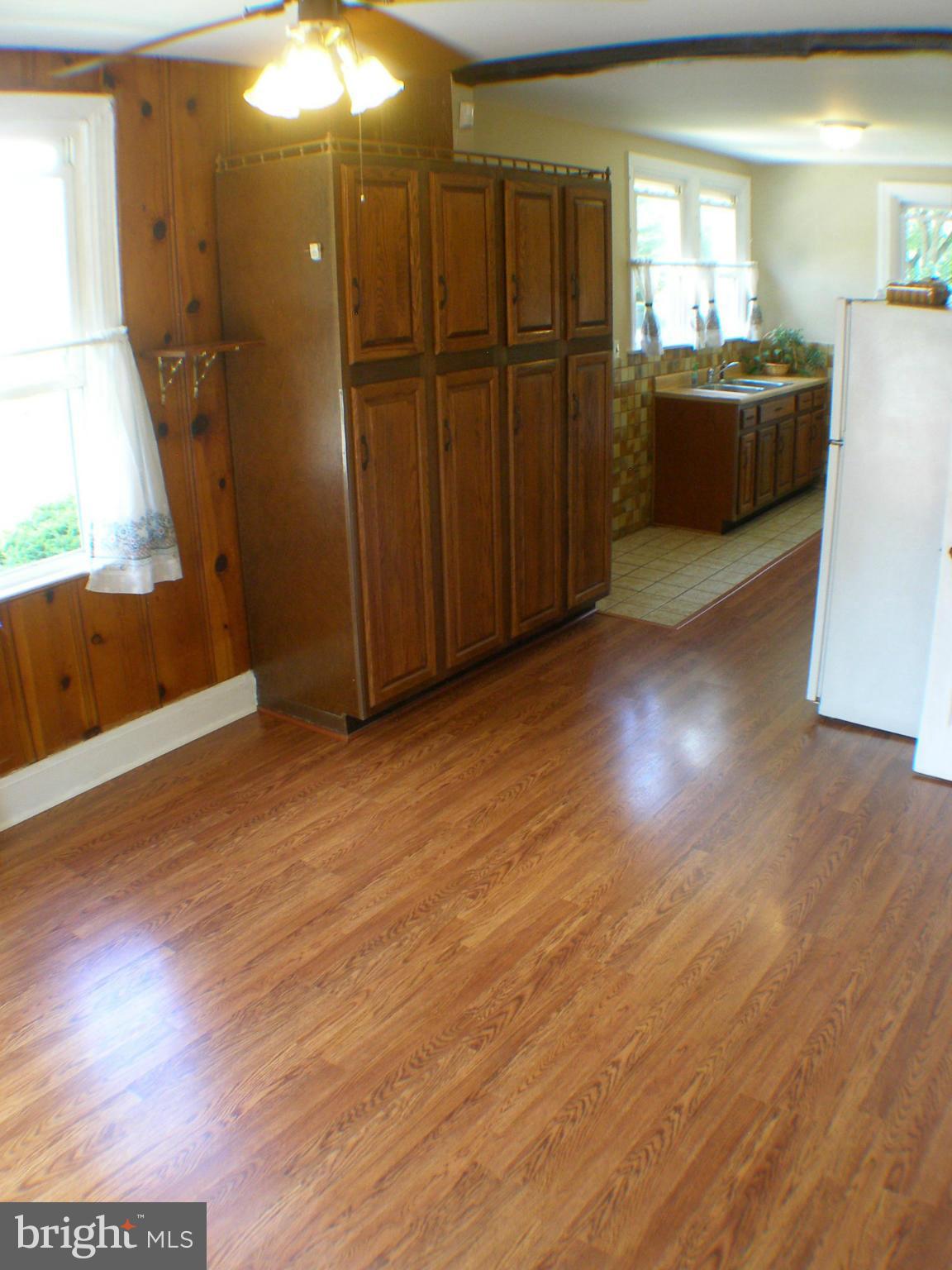3426 Chapman Road Randallstown, MD 21133 - Photo 12 of 29 New Flooring & Oak Cabinets in Huge Kitchen