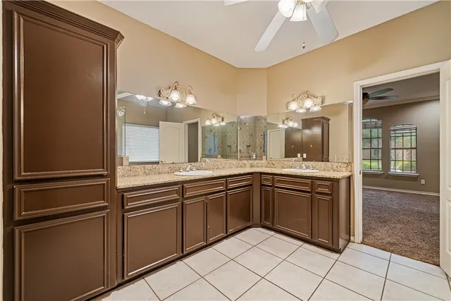 a bathroom with a bathtub and shower