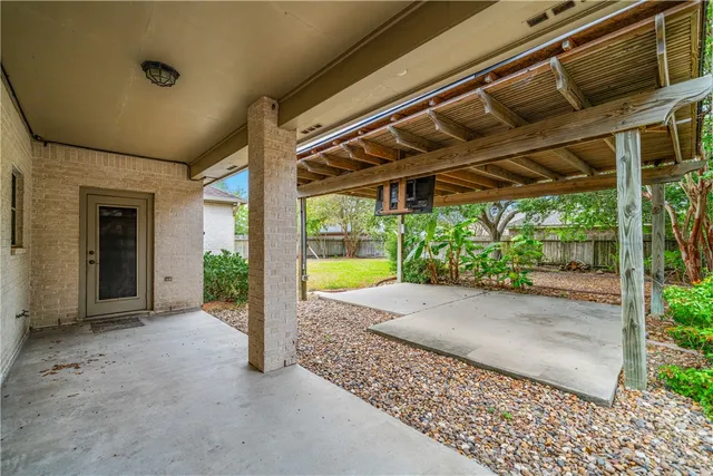 a view of backyard with green space