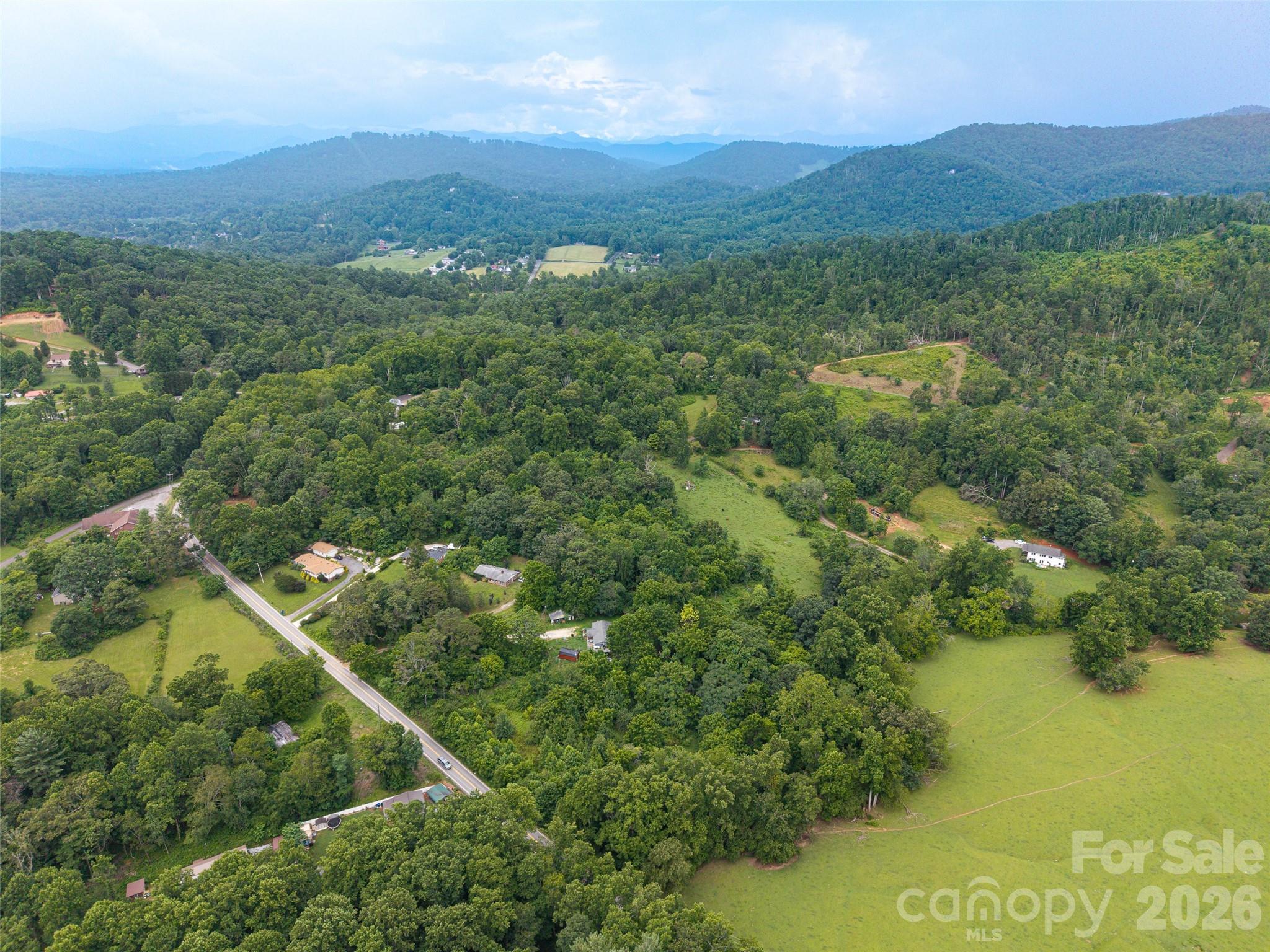 562 Concord Road Fletcher, NC 28732 - Photo 5 of 7 an aerial view of residential house with outdoor space and trees all around