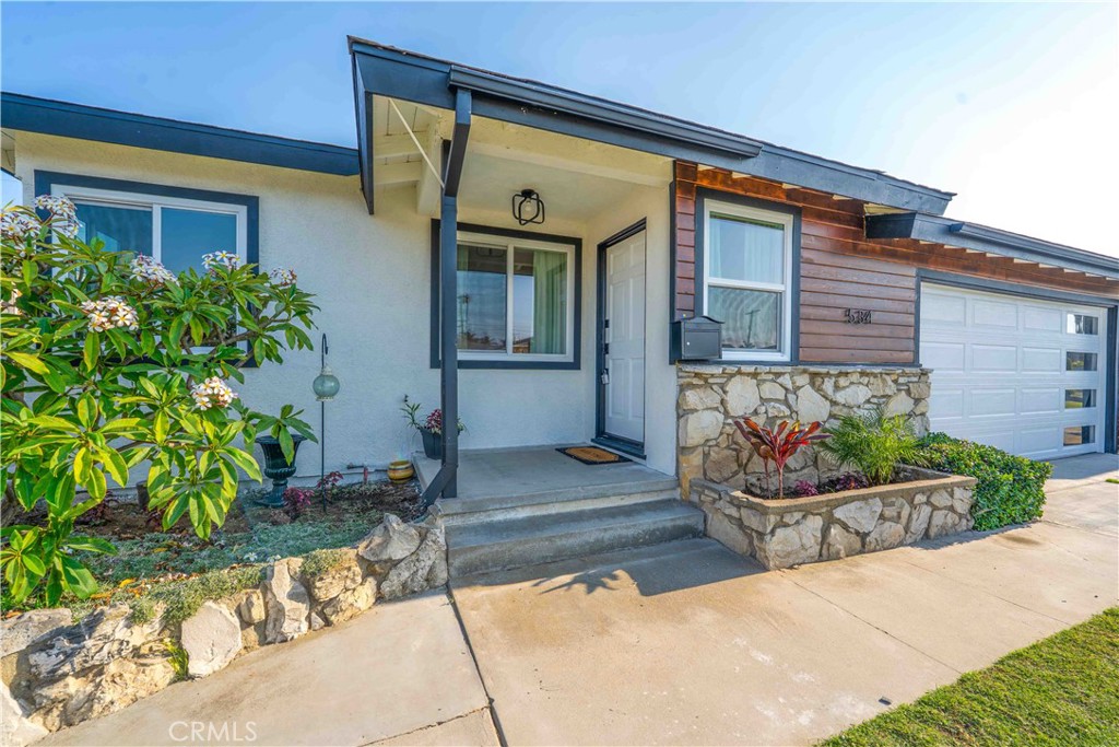 534 West 224th Place Carson, CA 90745 - Photo 2 of 35 a front view of a house with a yard