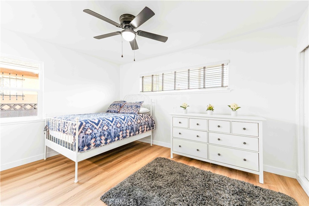 534 West 224th Place Carson, CA 90745 - Photo 27 of 35 a bedroom with a bed and a dresser in it