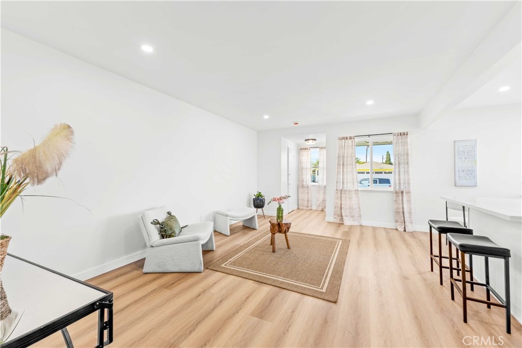 534 West 224th Place Carson, CA 90745 - Photo 6 of 35 a living room with furniture and wooden floor