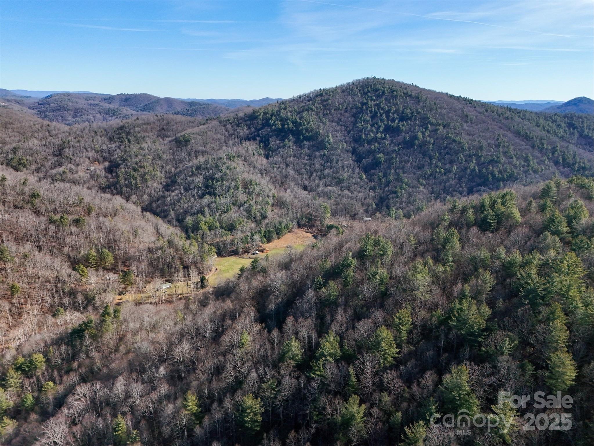 9999 Vacation Way, Unit 12 Roxboro, NC 27574 - Photo 6 of 13 a view of a house with a mountain