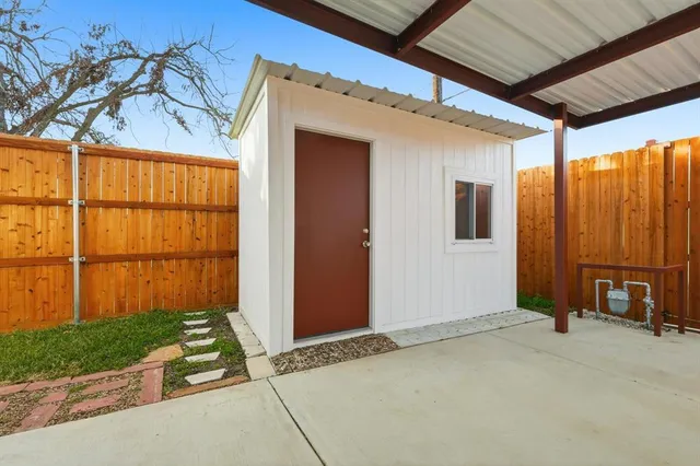 a view of backyard with green space
