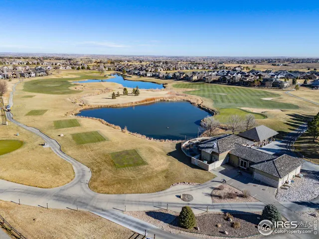 an aerial view of a house with outdoor space