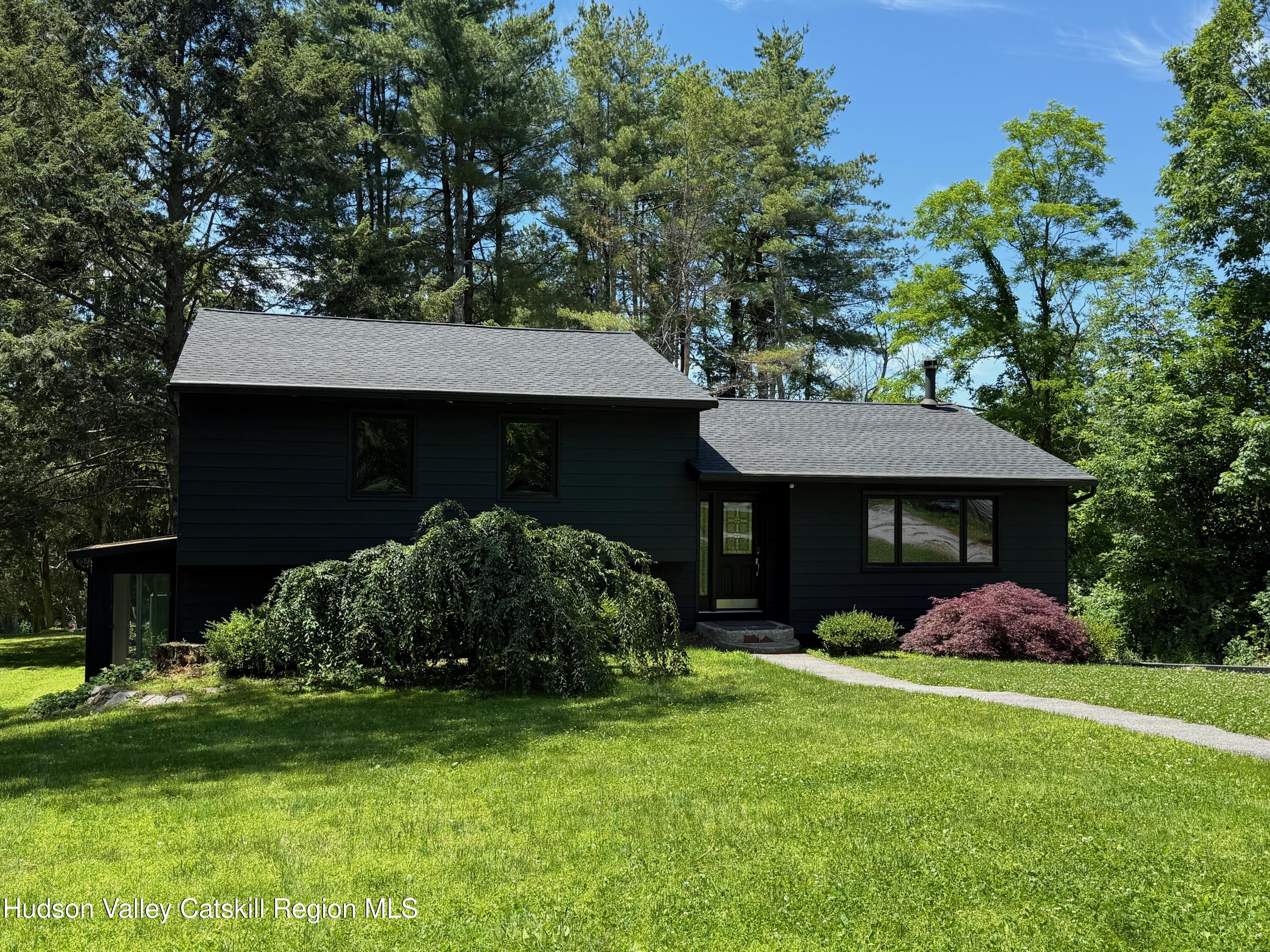 361 Allen Road Salt Point, NY 12578 - Photo 27 of 28 a front view of a house with garden